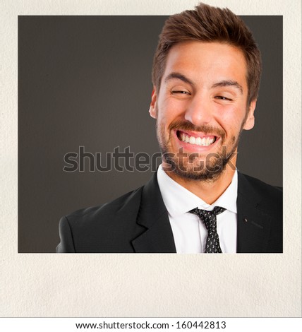 young man smiling on photo frame