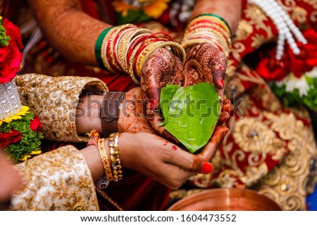 Indian wedding  photography ,groom and bride hands