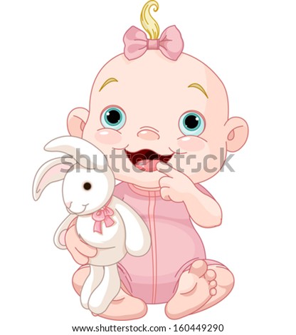 Adorable baby girl holding bunny toy
