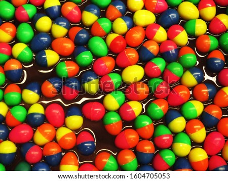 Colorful eggs in a tub