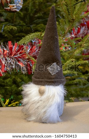 Christmas gnome under the Christmas tree