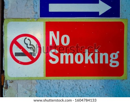 'No smoking' sign warns people to not smoke in the premises of building