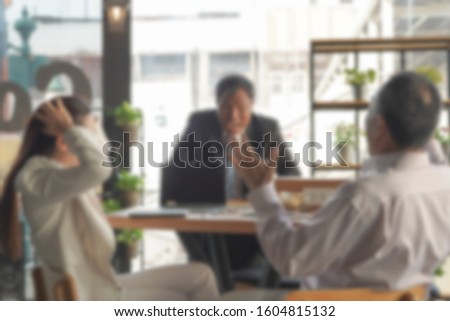 Blurred abstract background Business people arguing in meeting at the office.                