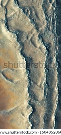 tortured skin, vertical abstract photography of the deserts of Africa from the air, aerial view of desert landscapes, Genre: Abstract Naturalism, from the abstract to the figurative, 