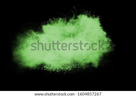 Green powder on black background.