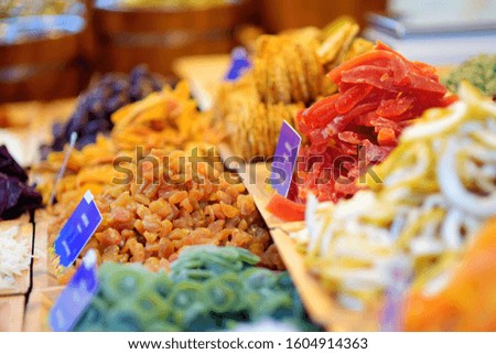 Assorted dried fruits on display at a farmer's market during traditional Lithuanian spring fair in Vilnius, Lithuania