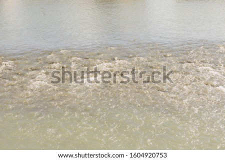 Blue water background. River backdrop