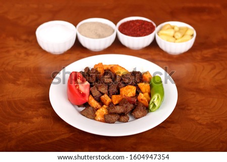 the one  picture Feed lamb liver with potatoes and tomatoes arnavut cigeri for Hotel & Restaurant Orders and Menu and Internet and TV