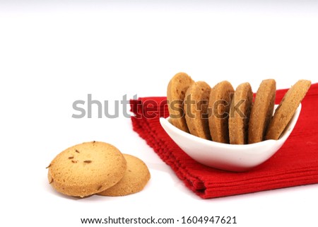 Stacked Salted Cumin Cookies or Jeera Cookies as we call them in India are ideal for tea time. Little Sweet and Little Salty isolated on White Background