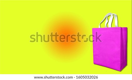 pink color ladies favorite bag on yellow background 