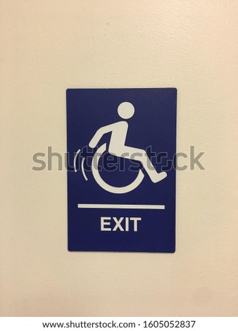 Blue Handicapped Exit / Entrance Sign with Motion Icon for Wheelchair