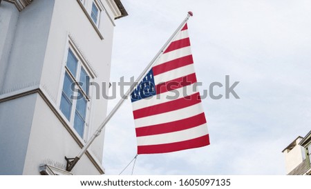 USA Flag outside building for advertising, award, achievement, festival, election. National Flag of USA waving on Pole