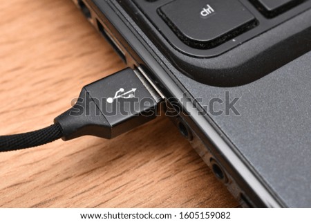 Connected USB cable in a laptop