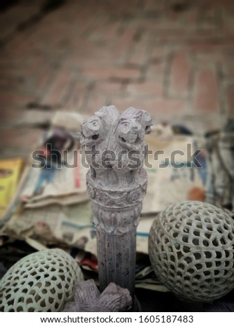 Pottery items are being sold at the Ghats of Varanasi in India. Bokeh shot of the wooden items are being sold in the Indian handicraft market. Indian sculptures made by wood and marble.
