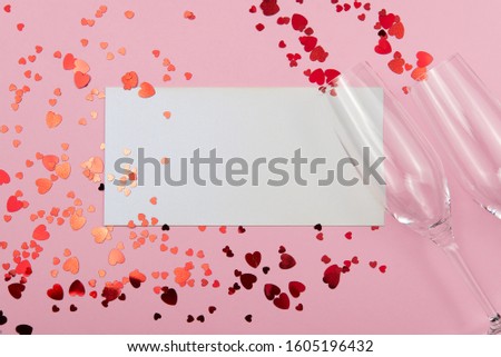 St. Valentine's day concept on a pink background with decorations. The concept of the St. Valentine's day, weddings, engagements, Mother's Day, birthday, New Year, Christmas and other holidays. Flat