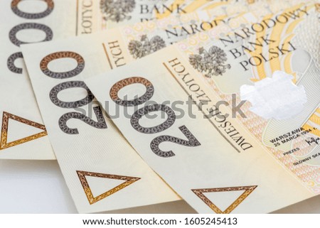 Stack of polish money. Business and financial concept. Polish Zloty banknotes PLN closeup 200
