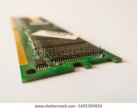 Random-access memory (RAM) is a form of computer memory that can be read and changed in any order, typically used to store working data and machine code. Computer part on white background. - Image