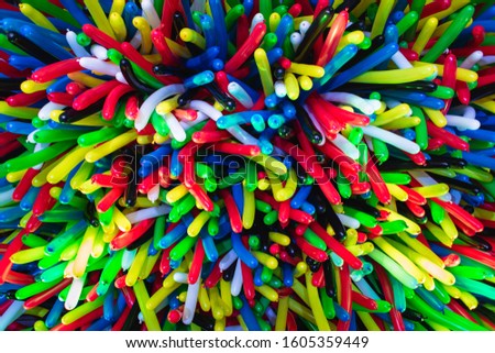 Background of multi-colored long balloons for a birthday party