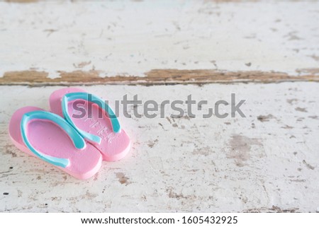 Summer time vacation concept. Beach Accessories,footware on white vintage wooden background. flat lay picture
