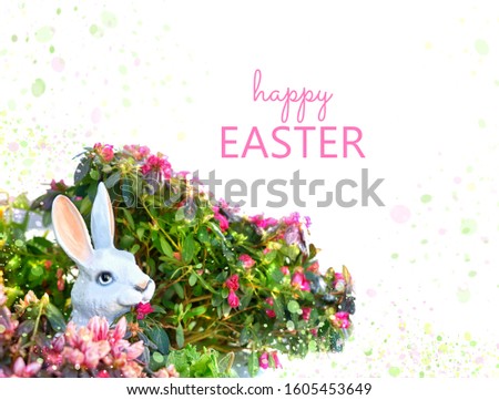 happy Easter greeting card.
Easter Bunny with flowers on abstract white background. festive spring season