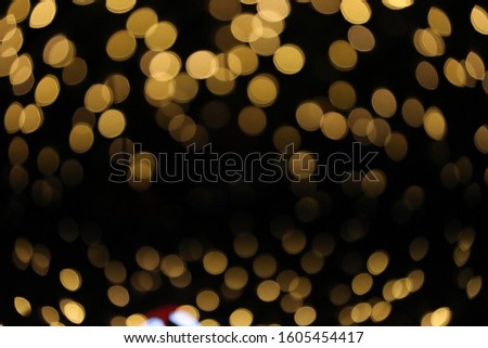 glitter vintage rose lights background. dark gold and black. 

