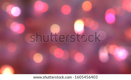 Red, pink, circular bokeh background. Beautiful abstract background with blur bokeh.
