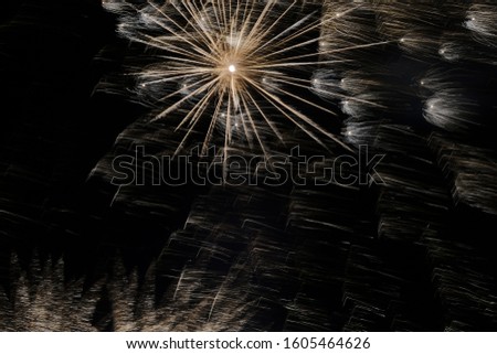 abstract painting with bright multi-colored beams of lightning on a black background, Mature pictures of fireworks. holiday landscape