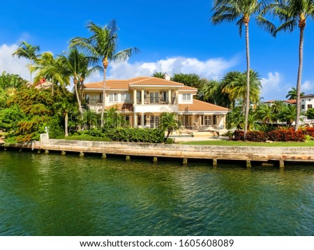 Canals and waterfront houses along New River in Fort Lauderdale. Las Olas Isles neighborhood Royalty-Free Stock Photo #1605608089