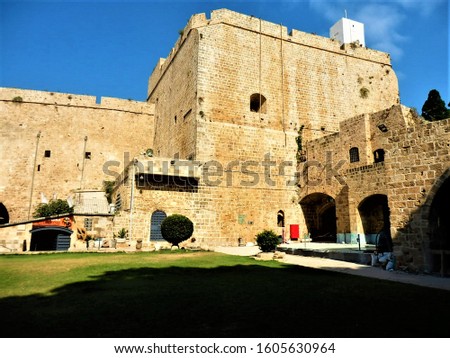 Defensive walls and tower of the fortress of the last Crusader Fortress in the Holy Land. Acre, Israel. Royalty-Free Stock Photo #1605630964