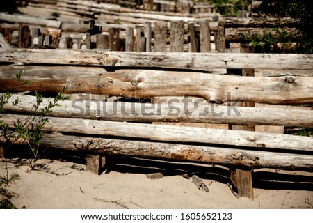 wooden fence, protection of sand dunes from the wind on the Curonian Spit. Curonian Spit, Russia