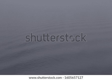 Waves in a foggy croatian lake