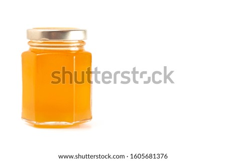 A Jar of Raw Natural Honey Isolated on a White Background