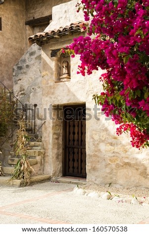 A doorway and stairs at the Carmel Mission in Carmel, Ca. Royalty-Free Stock Photo #160570538