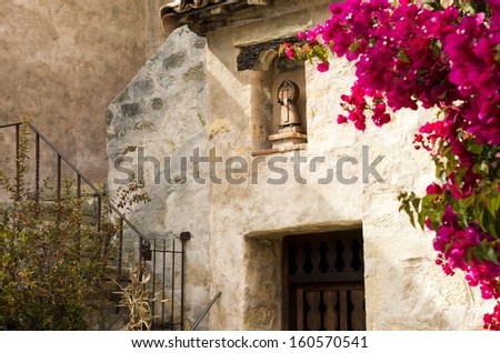 a doorway and stairs at the Carmel Mission in Carmel, Ca. Royalty-Free Stock Photo #160570541