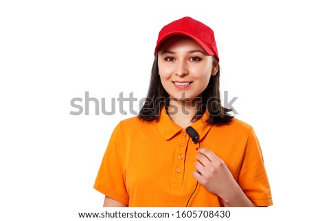 portrait of a young woman in bright clothes with a pins microphone. isolated on white background