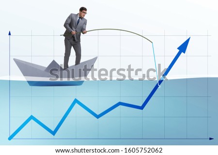 Businessman supporting economic growth with fishing rod