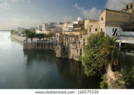 View of the old building on the banks of the River Ebro in Amposta, Delta del Ebro, Catalonia (Spain) Royalty-Free Stock Photo #160575530