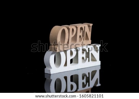 isolated black background of open sign 