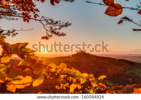 Lovely Autumn Landscape Panorama Picture of Northern Bavaria, Germany with colorful trees in the sunset