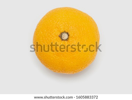 Orange fruit isolated on white background.top view. Royalty-Free Stock Photo #1605883372