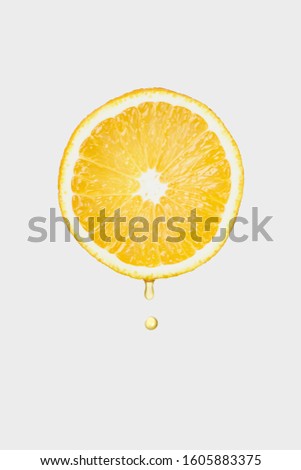 half fresh orange on white background. Royalty-Free Stock Photo #1605883375