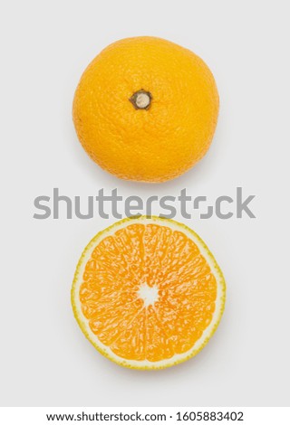 Ripe tasty orange wits slice isolated on white background. Royalty-Free Stock Photo #1605883402