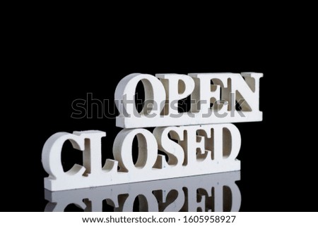 open and close sign isolated black background 