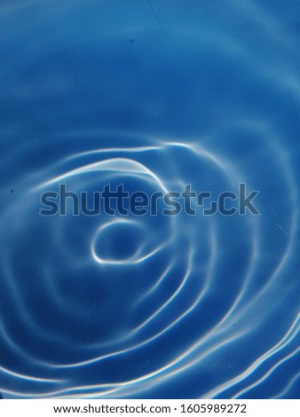 Backdrop of blue water texture. Blue water use for background