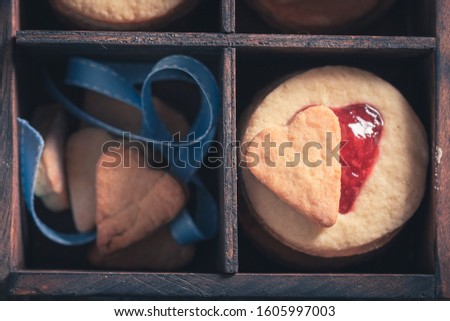 Gorgeous biscuits for valentine with red strawberries jam