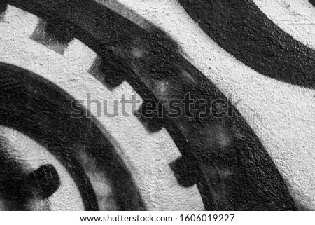 Art under ground. Beautiful street art graffiti background. The wall is decorated with abstract drawings house paint. Modern style urban culture of street youth. Abstract picture on wall