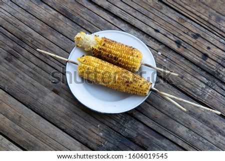 Pattern grilled corn on the plate