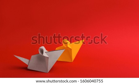 Paper origami of rats for Happy Chinese new year, red background, panorama, copy space