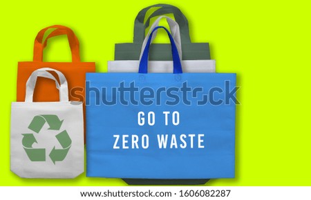Go To Zero Waste on Lime Green Color background. recycle icon printed bags