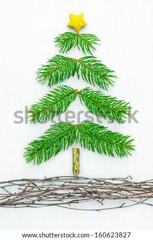 Christmas tree shaped from small pine branches 